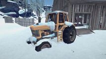 A snow-covered Tractor found commonly near the farms