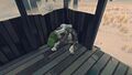 A corpse inside a Hunting Blind with a hatchet
